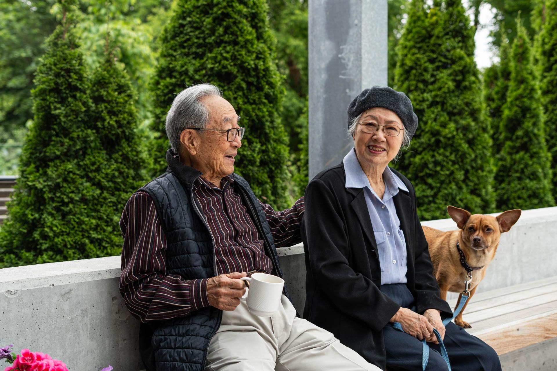 Seniors at Forestview on the porch with their dog